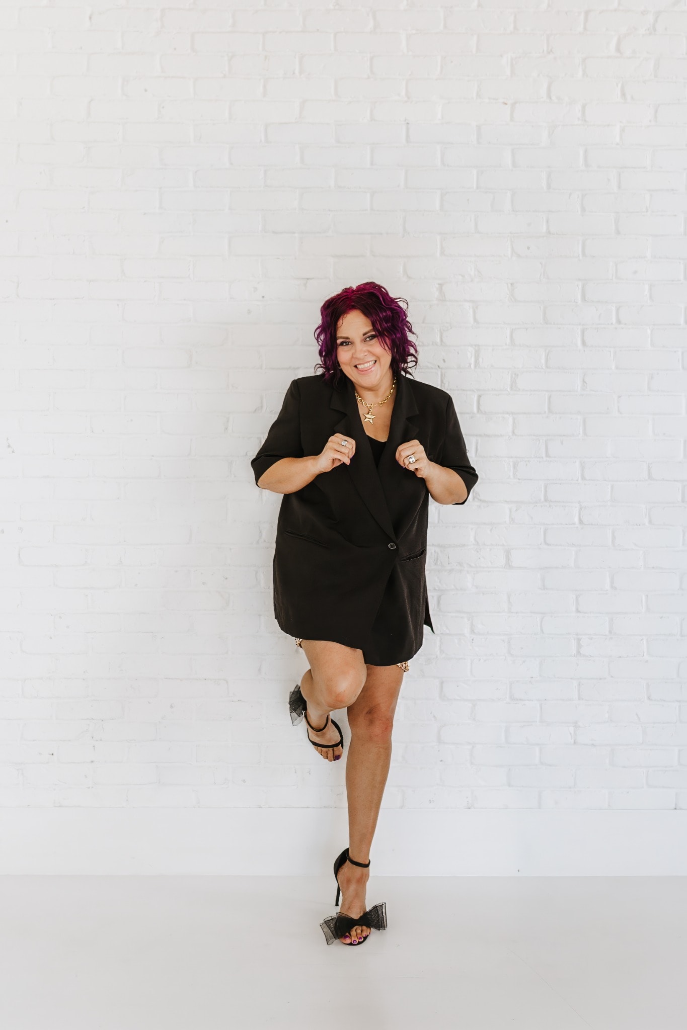 Courtney, your Sunkissed Academy educator, smiling in the studio